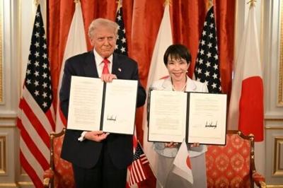 Japan's Prime Minister Sanae Takaichi (R) and US President Donald Trump attend a signing ceremony after a Japan-US Summit at the Akasaka State Guest House in Tokyo on October 28, 2025.