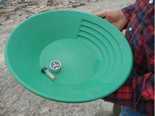 Members of Gold Prospector club practice their skills, seeking gold along Mississippi River at Herculaneum 