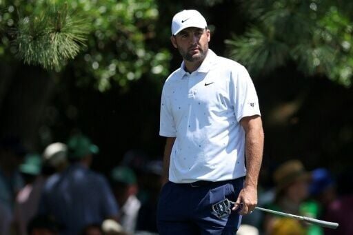 Top-ranked Scottie Scheffler opened with a birdie to reach eight under in the final round of the Masters