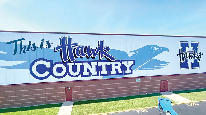 This 174-foot-wide-and-27-foot-tall mural now graces the east wall of Hillsboro High School.