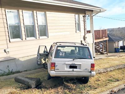 A man was arrested for an alleged DWI after he crashed this Jeep into this house on West MIller Street in De Soto.