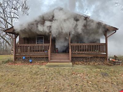 Fire damages De Soto-area home