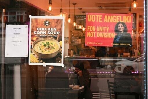 A poster backing Britain's Labour Party candidate Angeliki Stogia whose support is expected to be nibbled away by both the left and the right