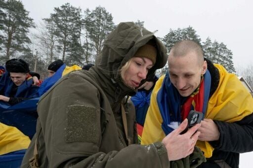 Family members joyfully and apprehensively waited to be reunited with loved ones captured by Russia in the war with Ukraine