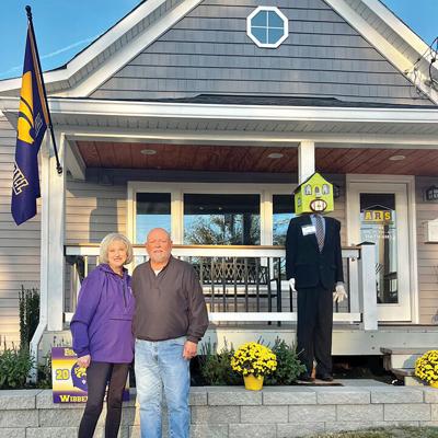 Owners Jane and Bob Wibbenmeyer outside their Eureka office.