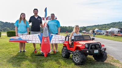 Lisa and Larry Leuchtmann with their daughters, Samantha, 10, and Charlotte “Charlie,” 6, at the St. Louis Radio Control Flying Association airfield in Eureka.
