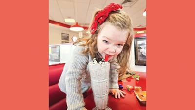 Penny Davis of Pevely earned first place in last year’s contest with photo of her granddaughter, Lyla Lee Davis of House Springs, drinking a milkshake at the Arnold Steak ’n Shake.
