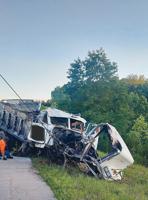 Cadet man hurt when dump truck runs off road near Hillsboro, catches fire