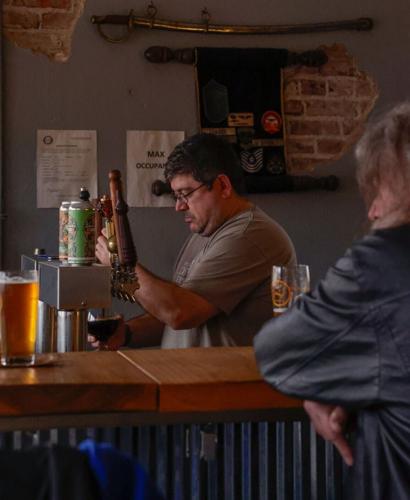 David Eich pours a beer