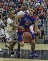 Pinkley scores 29 points, Hawks throttle Rebels