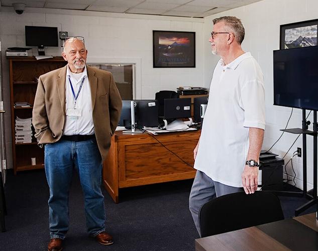 MECC reentry progam manager, Kenneth Korpecki, left, and Aaron Watkins inside the program’s center.
