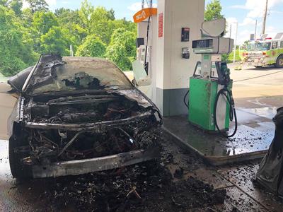 This car parked next to a gas pump at the Circle K on Richardson Road was destroyed by a fire Tuesday.