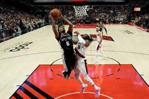 Stephon Castle of the San Antonio Spurs attempts a layup in the Spurs' victory over the Portland Trail Blazers in game three of their NBA playoff series