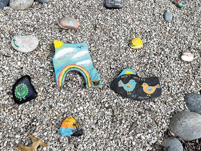 A variety of painted rocks can be found in the garden at the front entrance to the Mercy Hospital Cancer Center.