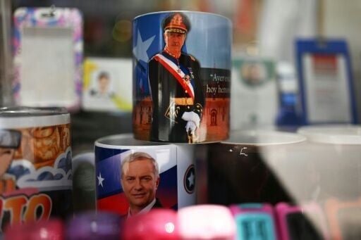 Mugs with images of Kast and late Chilean dictator Augusto Pinochet at a shop in the capital, Santiago