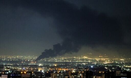 Smoke rises from the site of a US-Israeli strike on the Iranian capital Tehran on April 7, 2026