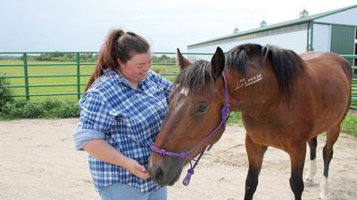 Mallory McBrayer, Connected Colts Ministry founder, and her mustang, Fame.
