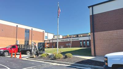 Roof repair work continues at Vineland Elementary, which will become De Soto Intermediate School this school year.