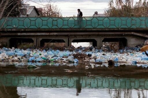 Plastic tide: trash-filled floodwaters after heavy rains in Durres, Albania