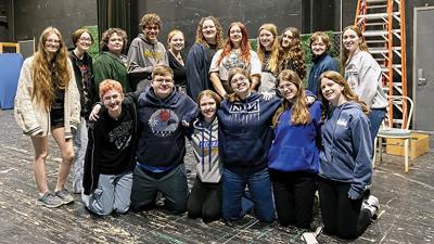 The cast of the Seckman High School spring musical, “Hadestown: Teen Edition,” pauses during rehearsal.