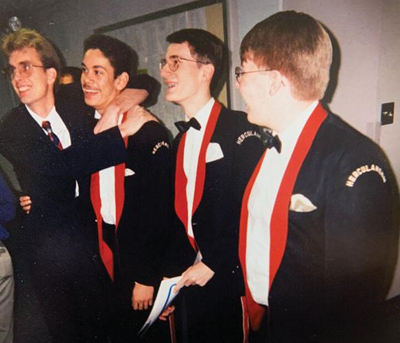 From left, Smelser and students Art McCoy, Andrew Miller and David French, react to their state rating at Jefferson College in 1998.