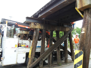 BNSF crews work on railroad trestle