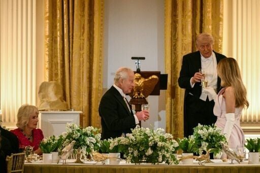 Britain's King Charles III shared a toast with US President Donald Trump and First Lady Melania Trump as Queen Camilla looks on during a State Dinner in the East Room of the White House