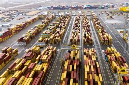 Shipping containers at Umm Qasr Port in Basra on March 12, 2026. Oil-rich Iraq has long been a proxy battleground between the United States and Iran