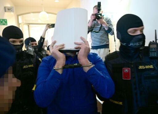 Other defendants were also escorted into the courtroom for the trial