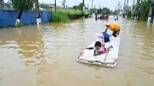 Emergency crews rescue stranded Sri Lankans as cyclone triggers heavy flooding