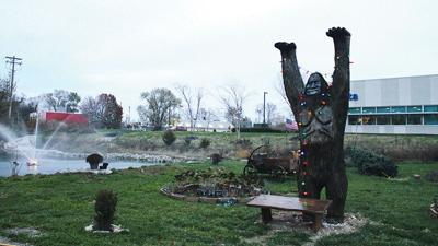 A Bigfoot statue and other decorations were installed at the House Springs pond.