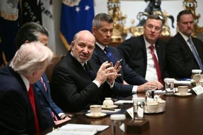 US Secretary of Commerce Howard Lutnick (3L) speaks as President Donald Trump (L) hosts a cabinet meeting at the White House on January 29