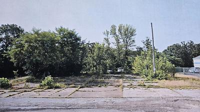 A small property on High Ridge Boulevard where a gas station once was located will be transformed into a county park.