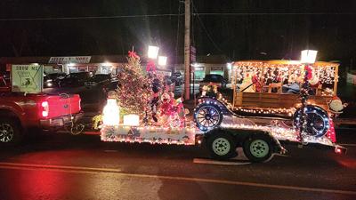 Show Me Antique Car Club’s float was among more than 30 floats participating in the 2025 House Springs Lions Christmas Parade.