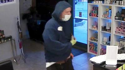 CUTLINE: The owner of Tribe Salon and Spa in Arnold posted this picture of a man seen in surveillance video Nov. 25 breaking into the business at 3924 Jeffco Blvd. The man allegedly returned to the same shopping plaza Tribe Salon is located at and broke...