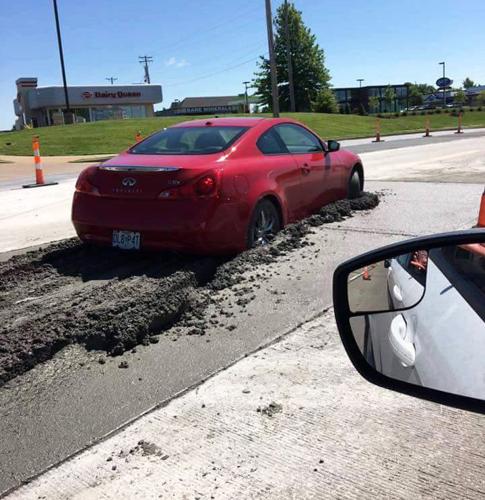 Woman drives Lexus into wet concrete on Richardson
