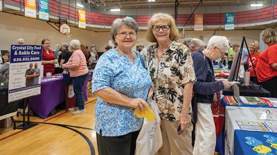 Audrea Poirrier of Festus, left, and Paula Ottofy of Arnold visit local vendors.