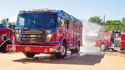 Herculaneum’s new fire engine 6310 was sprayed with water for the wet-down ceremony on May 11.