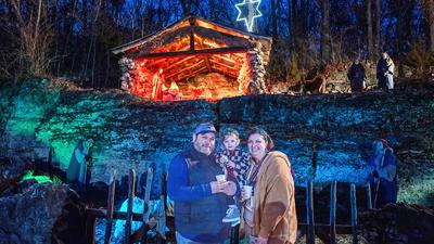 From left, Aaron Oliver, Arelia Oliver, 2, and Rachel Little, all from Imperial, visit the live nativity at the Canaan Baptist Church-Windsor Campus on Dec. 17.