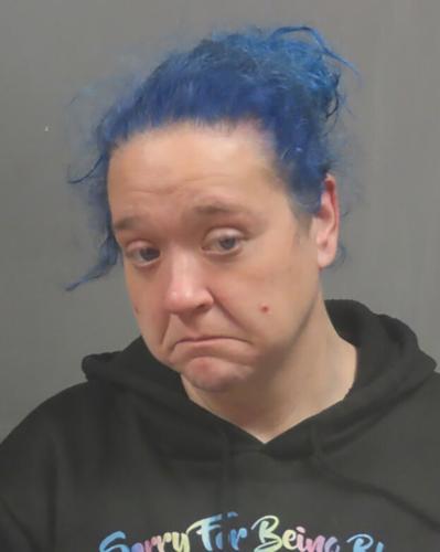 High Ridge woman allegedly hits man with car