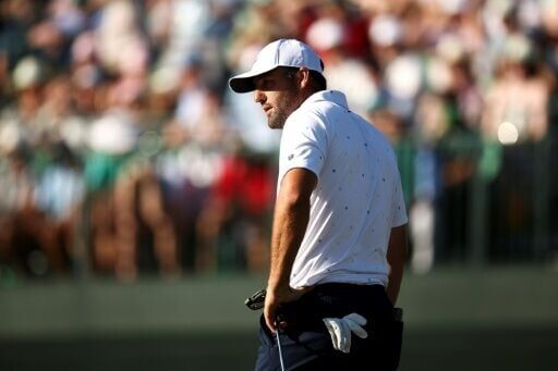 Scottie Scheffler reacts on the 72nd green in his runner-up finish at the Masters