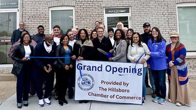 Danielle Kennedy cuts the ribbon for her clinic at 424 Main St. in Hillsboro.