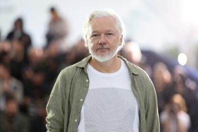 WikiLeaks founder Julian Assange says the Nobel Peace Prize should go to someone who promotes 'fraternity' between nations