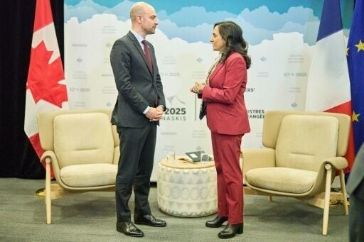 Canadian Foreign Minister Anita Anand (R) greets her French counterpart Jean-Noel Barrot at the G7 foreign ministers meeting in Niagara-on-the-Lake