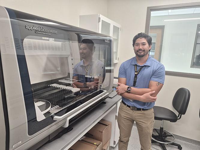 Jefferson County Sheriff’s Office Crime Lab Director Kevin Kellogg said the Nimbus Pro, at left, extracts and analyzes DNA samples.