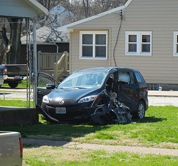 The driver side of a minivan was crumpled when an SUV crashed into it along North Fifth Street in Festus.