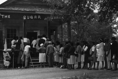 A group of voters lining up on May 3, 1966, outside the polling station in Peachtree, Ala., after the Voting Rights Act was passed the previous year.
