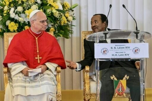 Pope Leo XIV urged an end to the conflict in a pointed speech next to Cameroon's President Paul Biya (R)