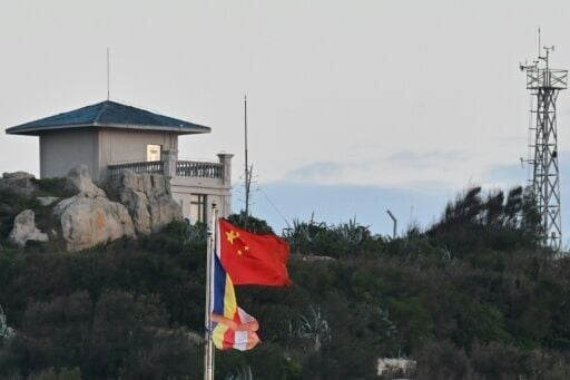 The Chinese flag (C) is seen on Pingtan island on December 29, 2025