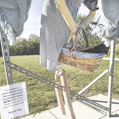 Someone Steals Dorothy S Ruby Slippers From Scarecrow Display Police Fire Myleaderpaper Com